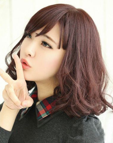 女生长脸型适合什么样的陶瓷烫发型 2015年长